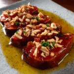 Mojama de atún con almendras y tomate
