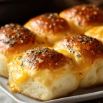 Rollos de brioche con queso cheddar y orégano First Image First Image