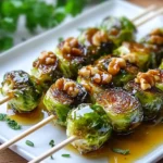 Brochetas de Coles de Bruselas Caramelizadas con Miel de Nueces First Image First Image