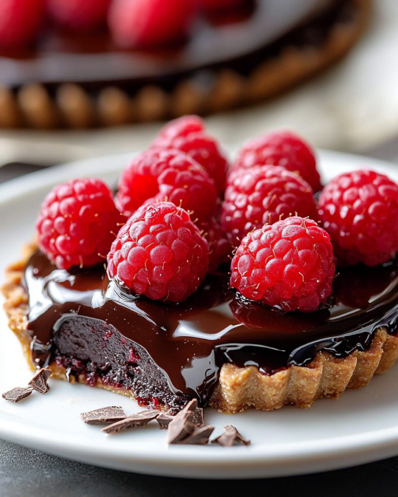 Tarta de Chocolate Oscuro y Frambuesas