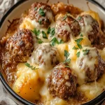 Albóndigas Indulgentes con Cazuela de Papas y Queso First Image First Image